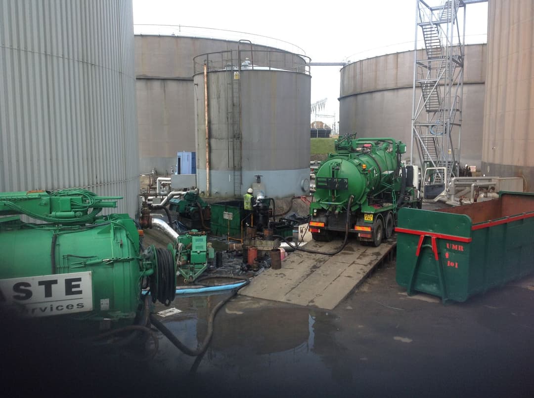 MacWaste tankers on site at a large tank farm cleaning project