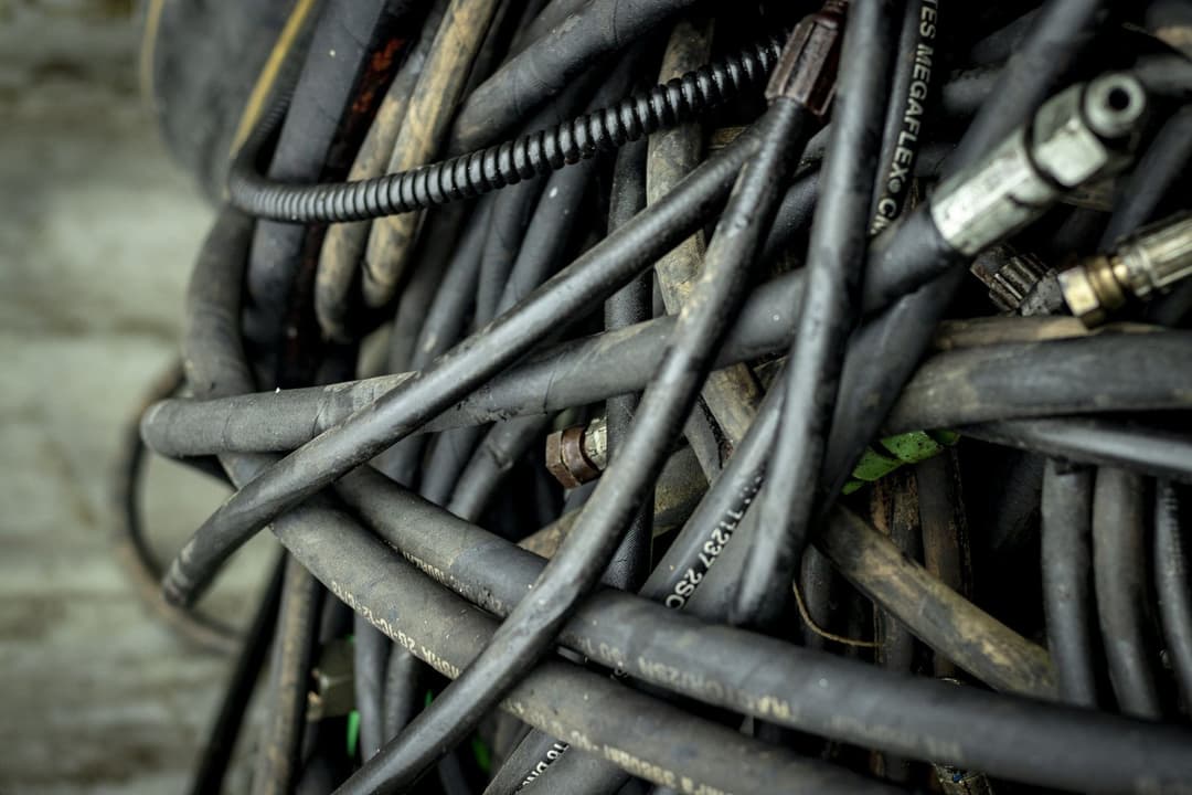 Waste hydraulic hoses collected from a workshop